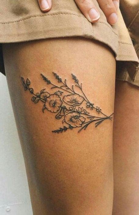 51 Sexy Thigh Tattoos For Women + Cute Designs and Ideas。